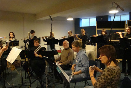 Present members recording their tracks for the CD